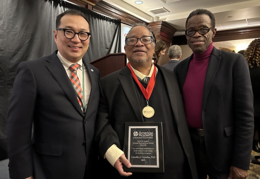 Dr. Llewellyn Cornelius with Dean Hong and University of Chicago Vice Provost Johnson at AASWSW on January 13, 2024