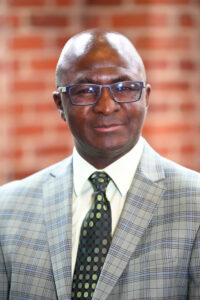 David Okech high resolution headshot