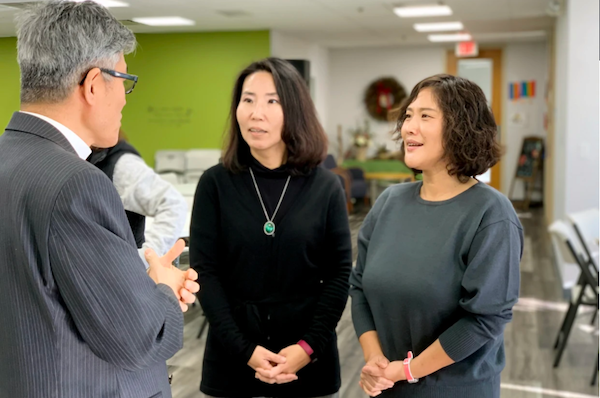 Joon Choi, center, and Ji Eun Han, right, recruit Korean American faith leaders in Chicago for a new program that helps pastors become empathetic advocates for domestic violence survivors. (Courtesy Joon Choi)