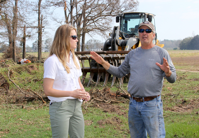 Decatur County farmer Bobby Barber, Jr., tells local University of Georgia Cooperative Extension Nan Bostick about the day Hurricane Michael struck his farm.